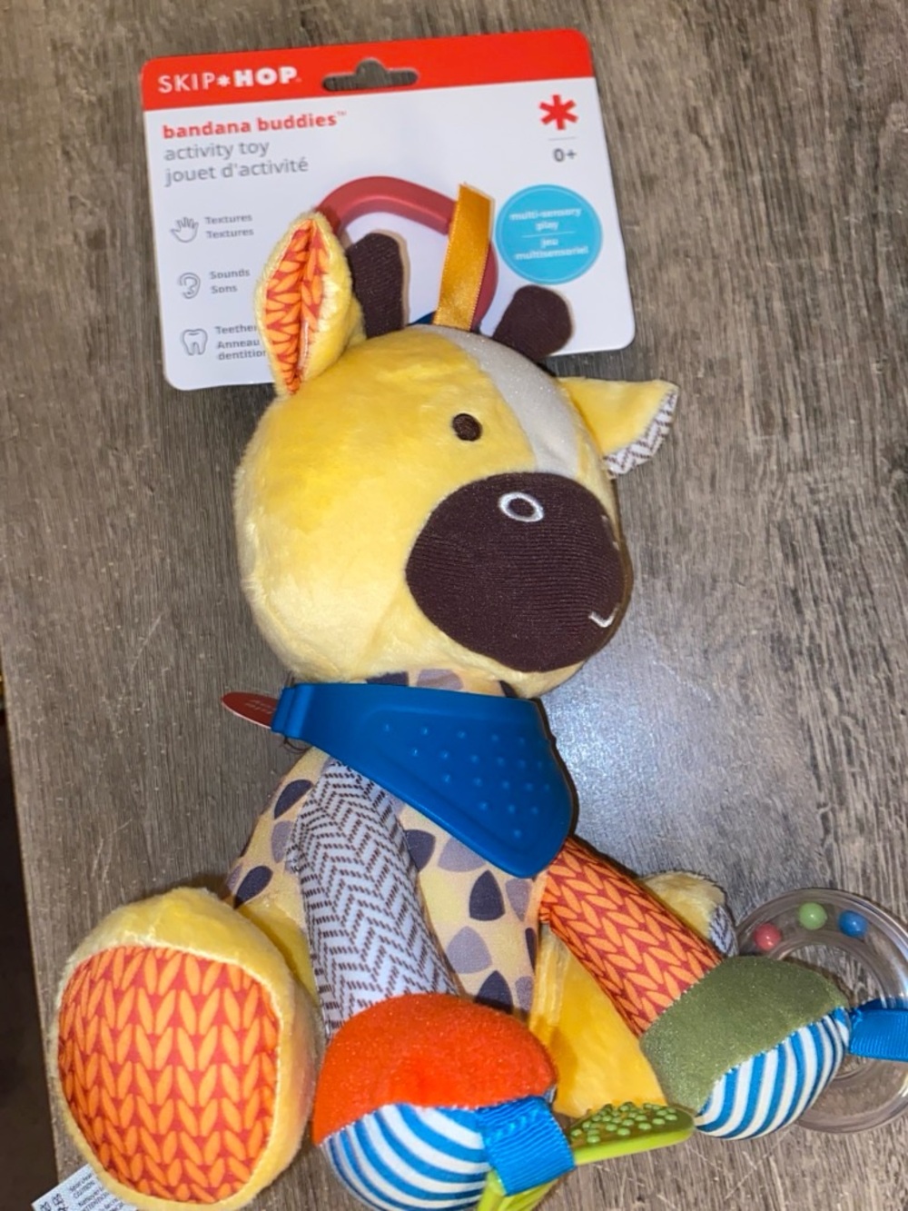 Skip Hop Yellow Giraffe Bandana Toy with Blue Teether